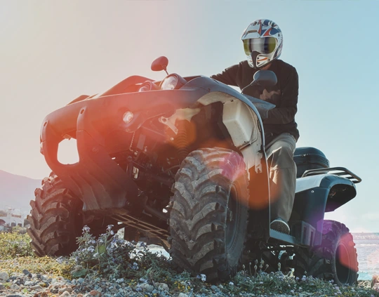 Transport d'un passager sur un quad